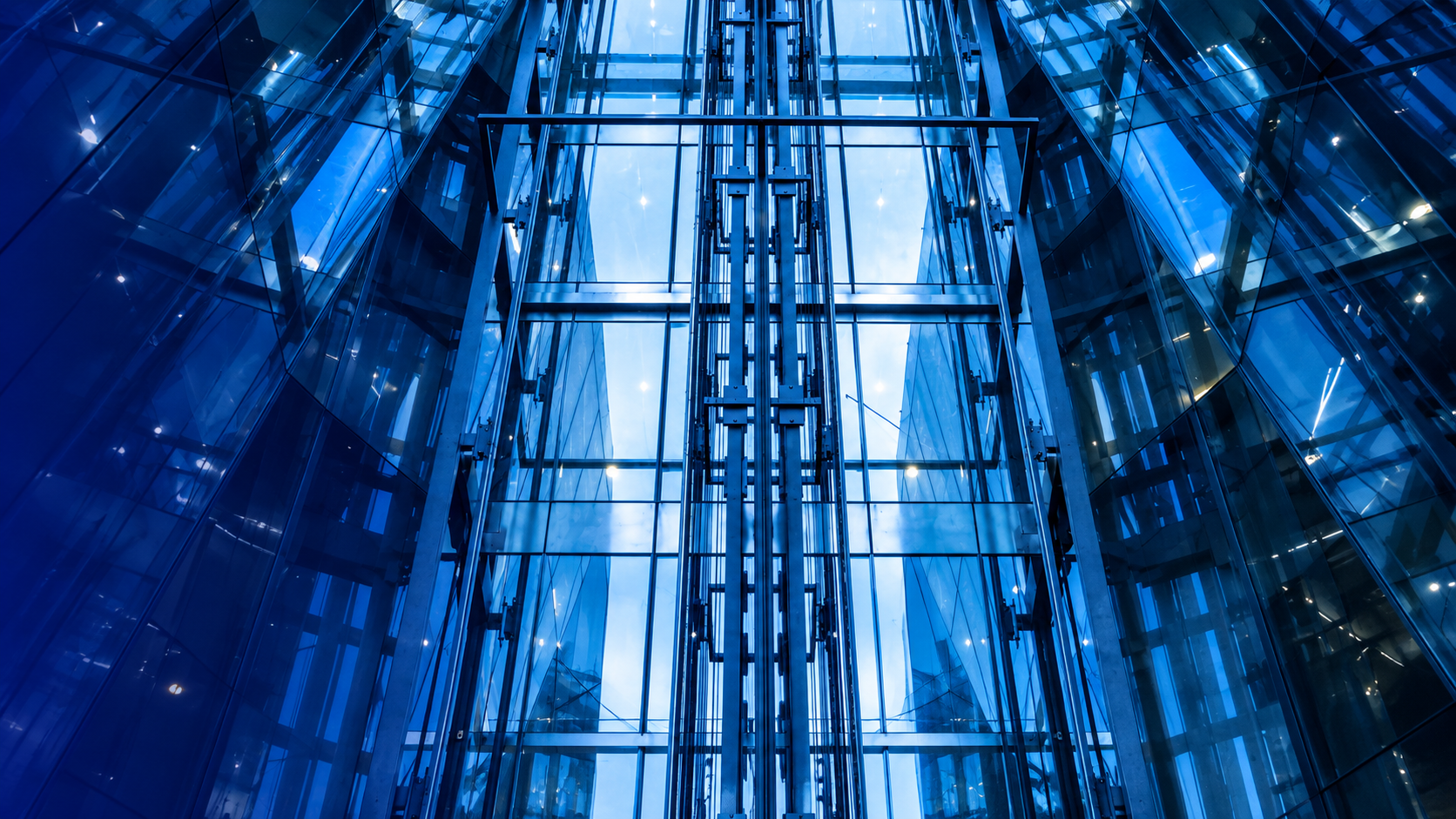 Modern elevator cabin in a glass shaft